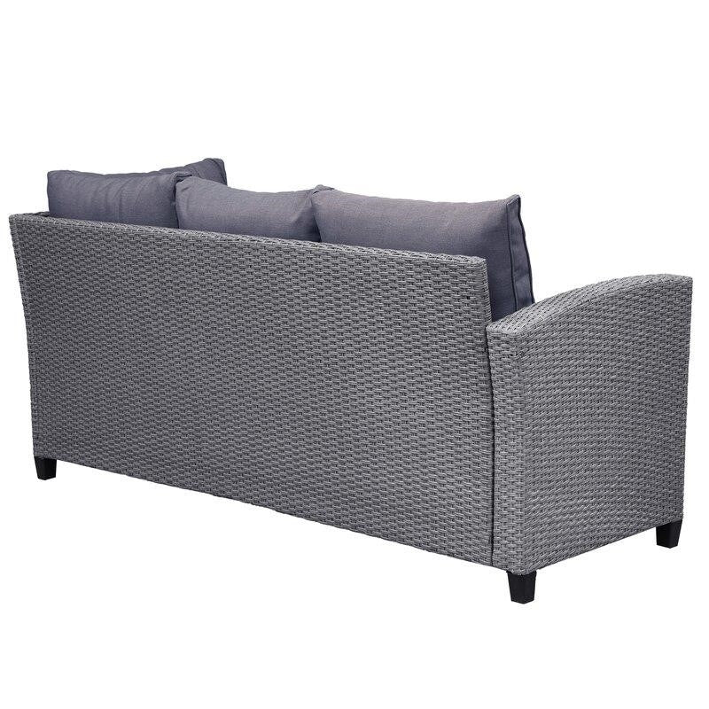 Julianna Wicker/Rattan 7 - Person Seating Group with Cushions