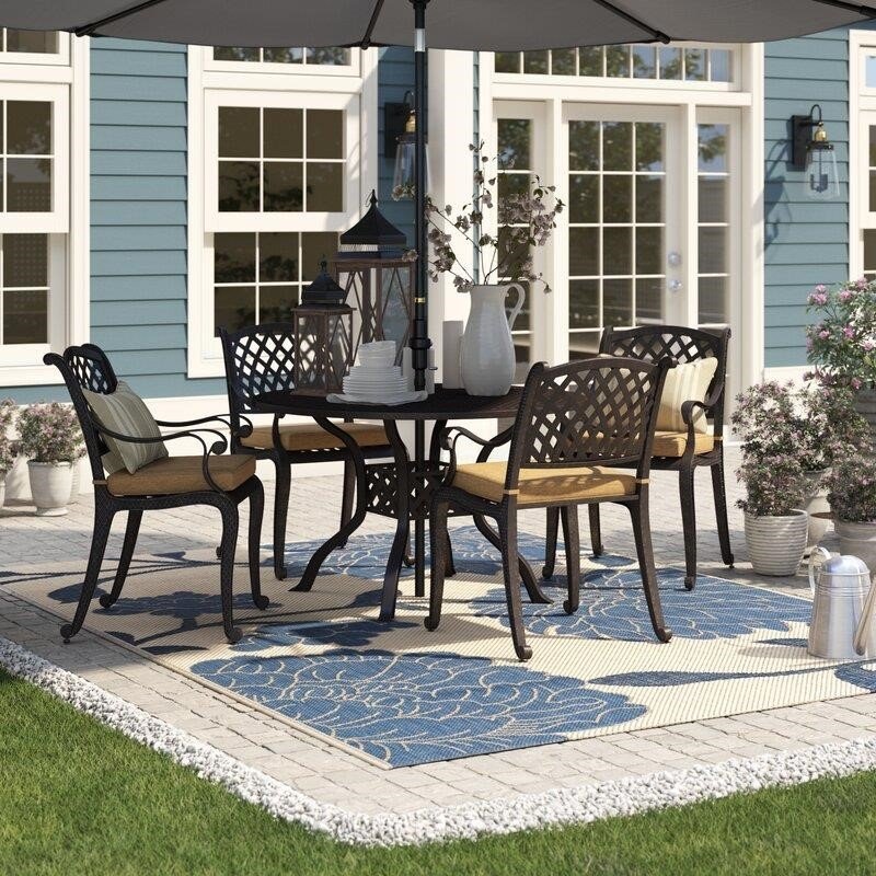 Chandlerville Round 4 - Person 48'' Long Dining Set with Cushions